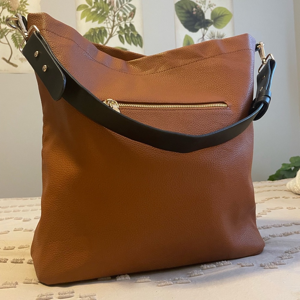 Vegan leather hobo bag. Camel. Great condition No scuffs or marks throughout.